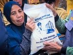 Ribuan Paket Beras Berlabel "Hj. Eva Dwiana" Mulai Didistribusikan Ribuan Paket Beras Berlabel "Hj. Eva Dwiana" Mulai Didistribusikan